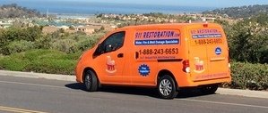 Mold Damage Restoration Van Driving To Job Location