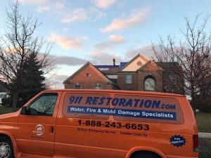 Water Damage Restoration Crew At A Residential Property